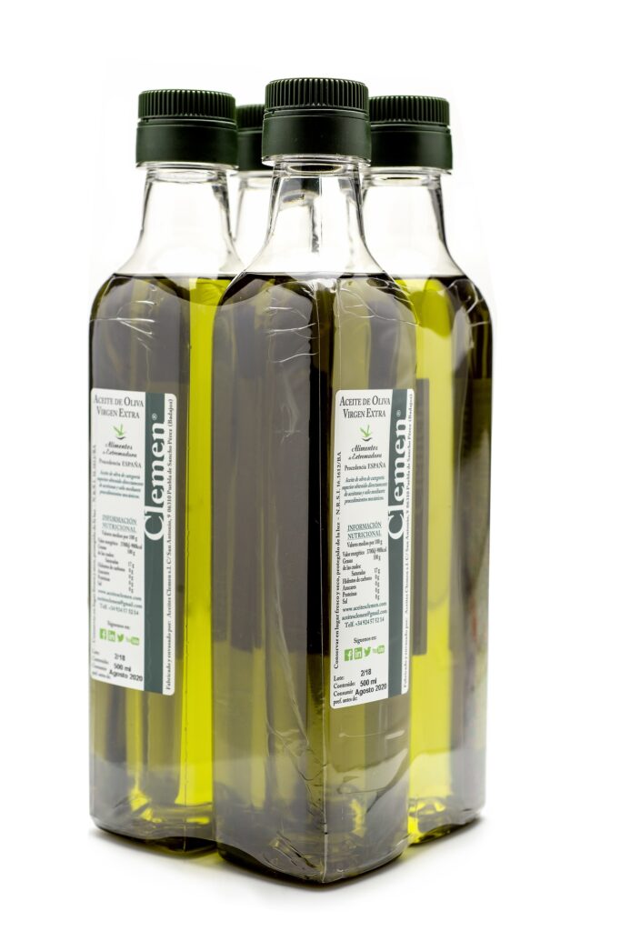 4 botellas de aceite pequeña de la marca Aceites Clemen